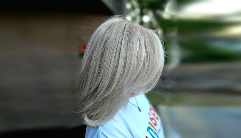 Smooth, sleek blonde hair after a smoothing treatment